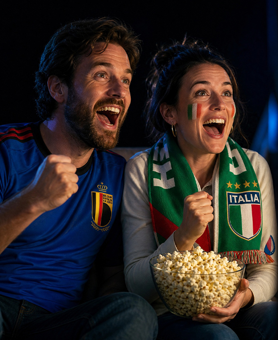 Cheering fans watching TV